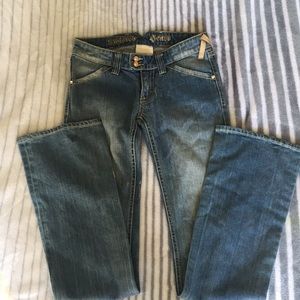 Twisted heart size 25 flare jeans